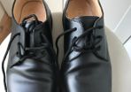 Black Doc Martin shoes.