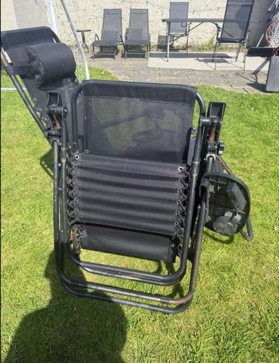 2 black recliner garden chairs