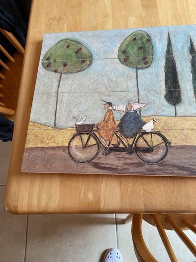 Picture titled 'A nice day for it'- on timber.