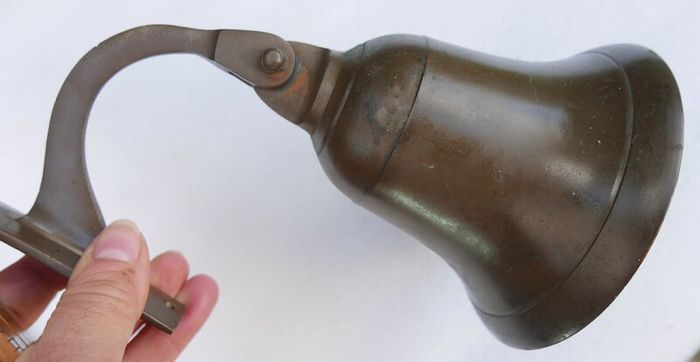 Vintage brass wall-mounted bell