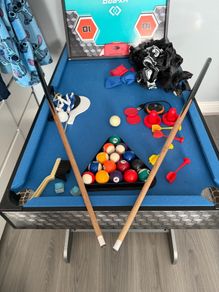 Multi game pool table