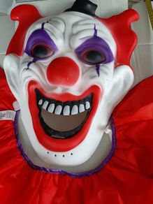 New in packaging large clown mask and frill