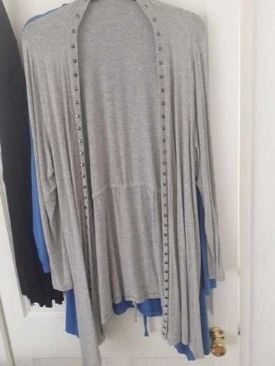 2 as new Womens cardigans .1 grey and 1 blue .Very dressy and long with studs down the front .Worn once .Size 20 from Saviour .10 each .