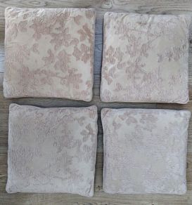 4 beidge sofa cushions