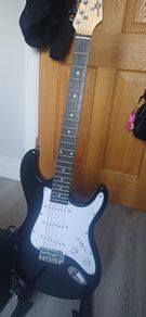 Electric Guitar, guitar case, Amp, strings and accessories