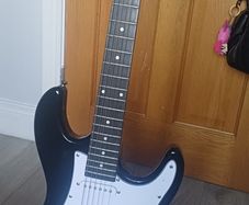 Electric Guitar, guitar case, Amp, strings and accessories