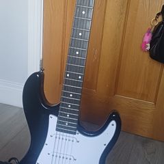 Electric Guitar, guitar case, Amp, strings and accessories
