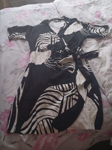 New Dress with tags very nice and dressy.