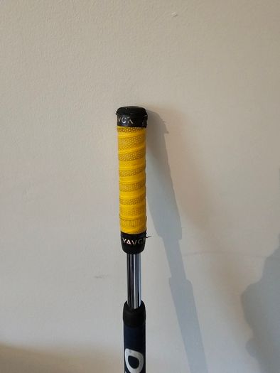 Odyssey broomstick putter.