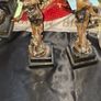 A Pair of Antique French Spelter Statues titled La Force (The Strength) and Le Pouvoir (The Power). The feature a male and female figure standing a top lions, raising up flaming torches Image 6
