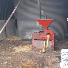 Grain storage/rolling setup for sale