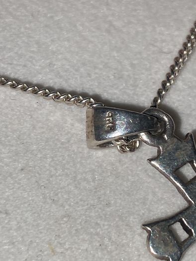 A silver marcasite cross & chain
