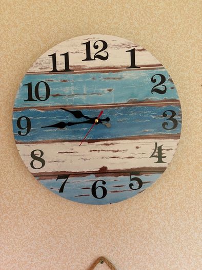 Nautical wall art and clock.
