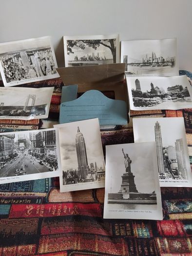 Old postcard album with 80 cards from 1914 to 1955,plus 10 miniature photos of New York,5 old John Hinde,postcards,3 old Iraqui postcards