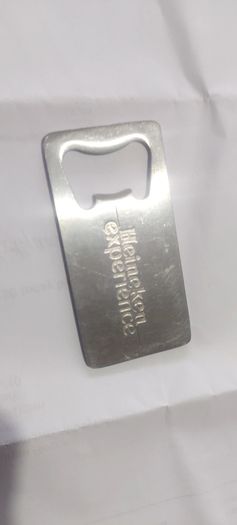 heineken bottle opener, see pictures for condition, buyer collects or pays postage thank you,sold as is