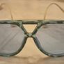 Aviator sunglasses with blue lenses and gold-tone arms Image 2