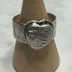 Handmade sterling silver love heart ring with trickles on the wide band. Size R
