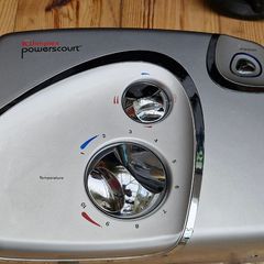Electric shower with pump