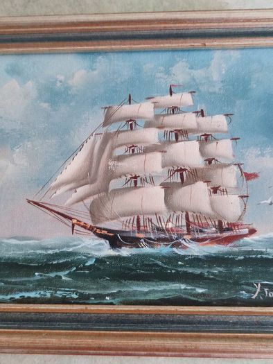Framed oil of a sailing ship on board signed Y. Jones