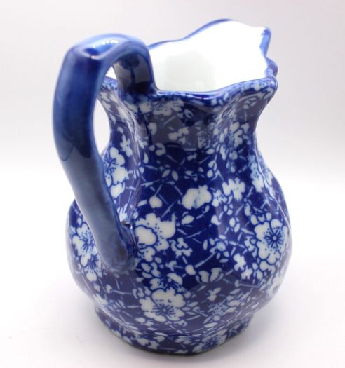 .. PRICE DROP.. Porcelain Lot - Milk jug, chintz plates.