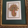 Framed in gelted frameThe painting of traditional Jewellery designs in Marble is done with gold leaf and colored glass. This art has its origin in the royal city of Jaipur  once a design is drawn on marble tile. the frame is 23 x20 cm. the center is 10 x  Image 3