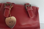 New leather make up bag tag attached
