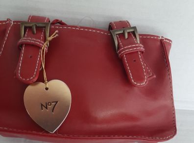 New leather make up bag tag attached