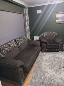 Grey 3 seater and 1 large armchair