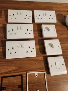 double socket, dimmer light switch, single light switch