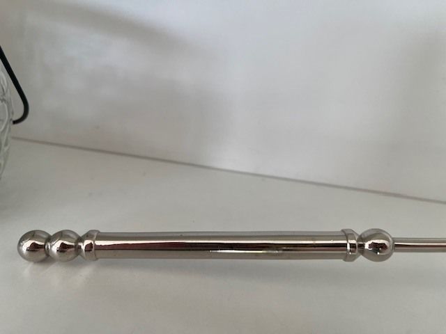 Metal Handle Candle Snuffer. Silver Finish. Moveable Head. With Hanging Tea Light. In Excellent Condition.