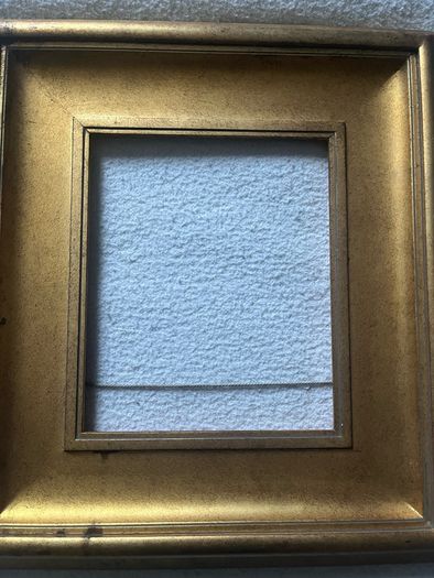 frame This is a modern, deep-profile gilt wood picture frame with a slip / inner liner profile.
