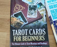 Tarot card set and book.