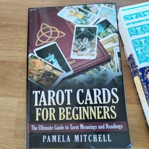 Tarot card set and book.