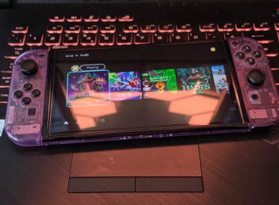 Nintendo Switch OLED (Clear Atomic Purple)