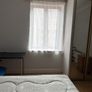 Room with double bed and attached washroom Image 4