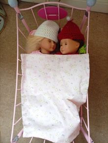 Our Generation Dolls Bundle & Pink Metal Doll Cot with Bedding. Unwanted present for grandchild who is too old to play with them.