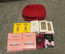 Perfume samples plus a cosmetics bag