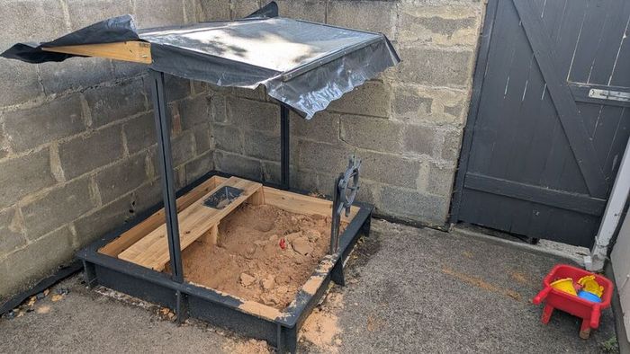Wooden sandpit