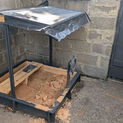 Wooden sandpit