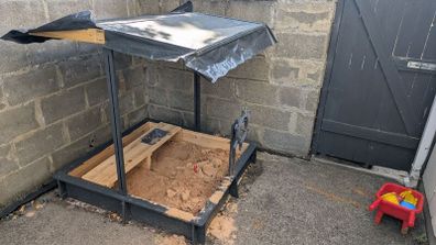 Wooden sandpit