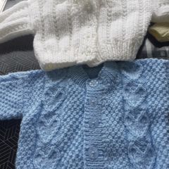New baby cardigans x6 and 2 hats .Hand knit  .2 blue  1 lemon 2 white 1 green 2 blue hats .Size 0-3 months never worn .25 euro the lot .Collection Dublin 13