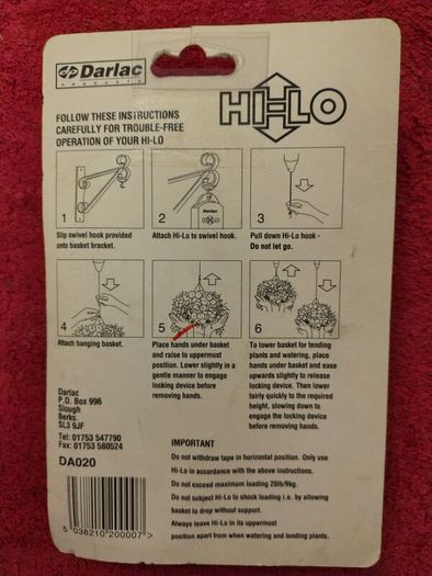 Device to raise and lower hanging basket for watering