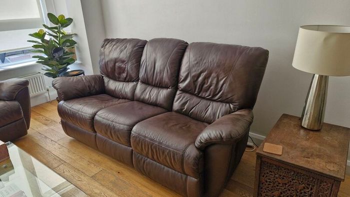 Suite of reclining leather sofas