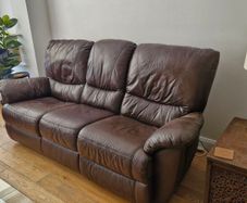 Suite of reclining leather sofas
