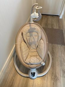 Nested electronic baby swing