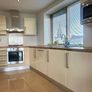 Immaculate High Gloss Kitchen & NEFF Appliances Image 3