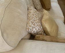 9 foot long cream sofa