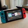 Nintendo Switch Plus 4 Games and Case. Image 2