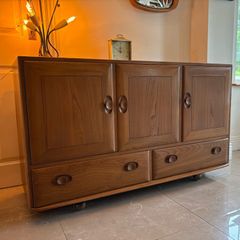 Ercol - elm and beech 'Windsor' model 468 sideboard,