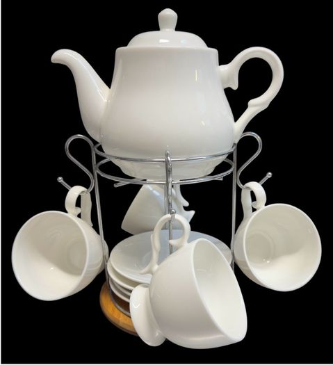 White ceramic coffee set with stand.